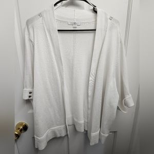 White short sleeve sweater.